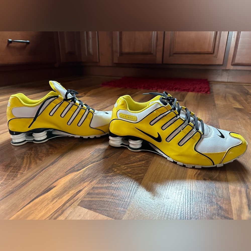 Yellow Nike Shocks. Men’s size 9/Women’s size 10. Worn only once or twice.